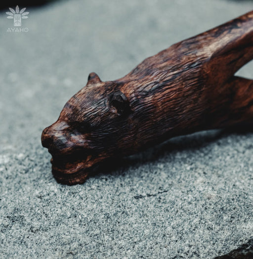 Mango wood kuripe pipe, exquisitely hand-carved with a bear totem, embodies traditional shamanic practices for hape snuff as a unique spiritual tool.