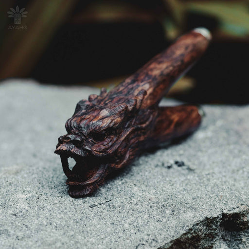 Hand-carved dragon totem kuripe, a shamanic rapéh applicator pipe, used in sacred ayahuasca ceremonies for spiritual healing, meditation, and as a unique herbal medicine tool.