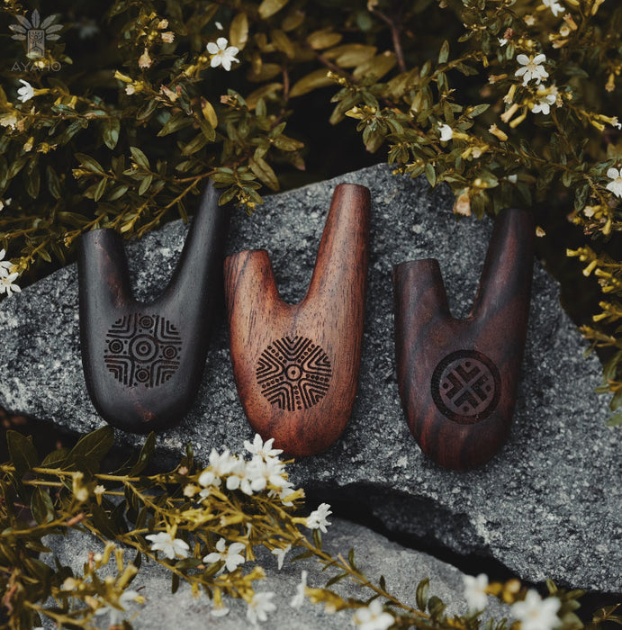 Discover the spiritual essence of the shamanic ritual with this handmade Kuripe pipe, a unique tool for Rapéh ceremonies. Crafted from rosewood and adorned with sacred geometry,  a special gift imbued with healing and protection