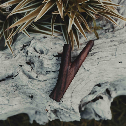 Experience the grounded simplicity of this Rose Wood Kuripe, a traditional hape applicator. This handcrafted tool, essential for hape snuff rituals, resonates with the harmony of nature, offering a direct connection to the earth's energy.