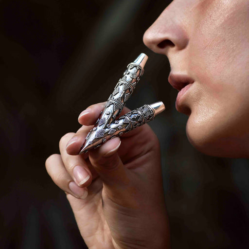 Elevate your spiritual sessions with this sterling silver Kuripe, a masterfully crafted snuff applicator. Its ornate design not only serves as a shamanic tool but also as a wearable piece of art, doubling as a unique kuripe necklace. Ideal for hape snuff rituals, this piece is a handcrafted gift that embodies tradition and protection.