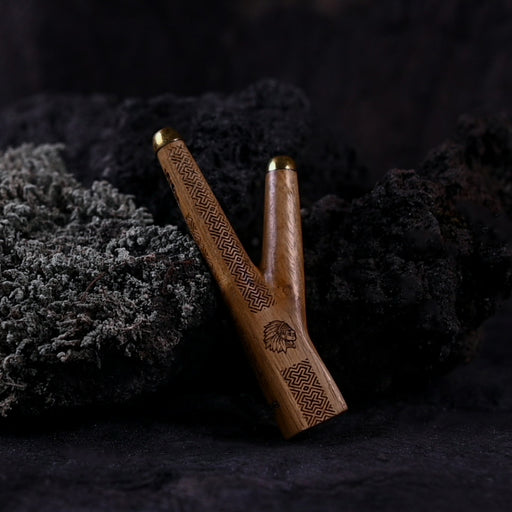 This teak wood Kuripe, adorned with a Shipibo pattern, is a handcrafted pipe for hape ceremonies. It serves as a spiritual meditation tool, promoting healing and protection. A unique shamanic gift that combines herbal medicine and sacred geometry.