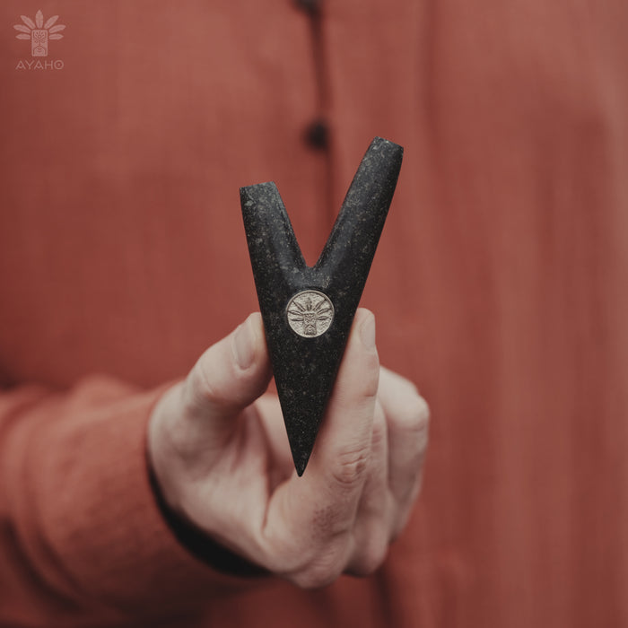 Elegant bronze logo on Kuripe made from volcanic stone, adding charm.