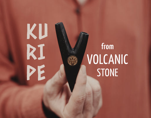 Exquisite shape of Kuripe made from volcanic stone, harmoniously blending with natural elements.

