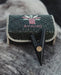 Nature's craftsmanship in Kuripe made from volcanic stone with a bronze logo, reflecting harmony and style.