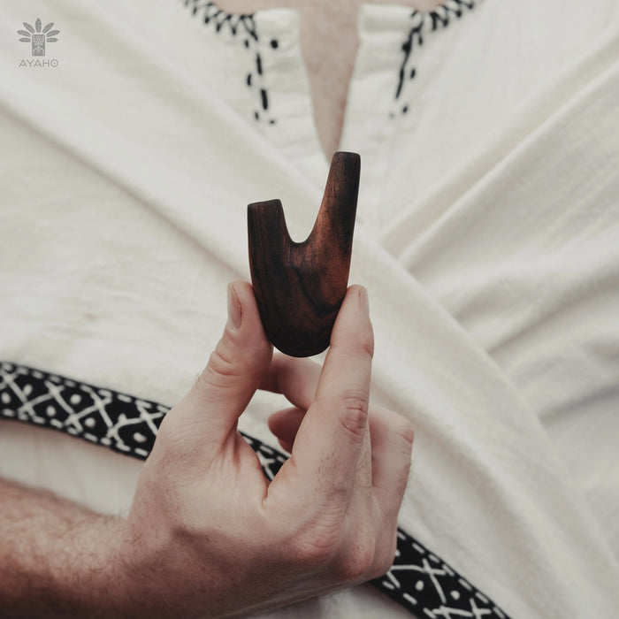 Discover the spiritual essence of the shamanic ritual with this handmade Kuripe pipe, a unique tool for Rapéh ceremonies. Crafted from rosewood and adorned with sacred geometry,  a special gift imbued with healing and protection
