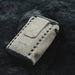 Handmade, compact leather pouch that securely attaches to your belt, perfect for storing Rapeh and other small items