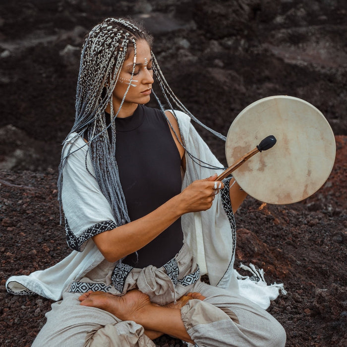 Hand-tuned tribal drum with intricately carved dragon handle, perfect for sound healing and spiritual ceremonies, crafted for a premium cosmic sound experience