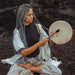 Hand-tuned tribal drum with intricately carved dragon handle, perfect for sound healing and spiritual ceremonies, crafted for a premium cosmic sound experience