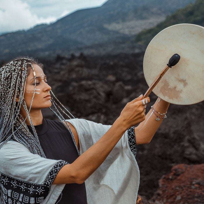 Hand-tuned tribal drum with intricately carved dragon handle, perfect for sound healing and spiritual ceremonies, crafted for a premium cosmic sound experience