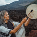 Hand-tuned tribal drum with intricately carved dragon handle, perfect for sound healing and spiritual ceremonies, crafted for a premium cosmic sound experience