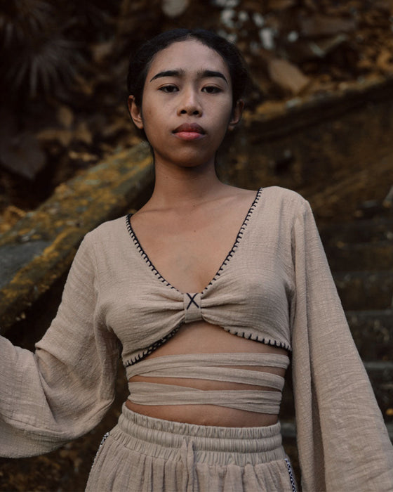 Embrace the essence of freedom and individuality with our &quot;Wind Dance&quot; Top, a meticulously designed cotton tee for those who walk the path of self-discovery and harmony.