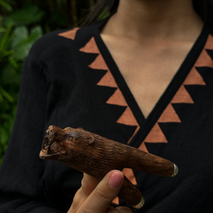 Mango wood smoking pipe with a bear totem, perfect for shamanic rituals.