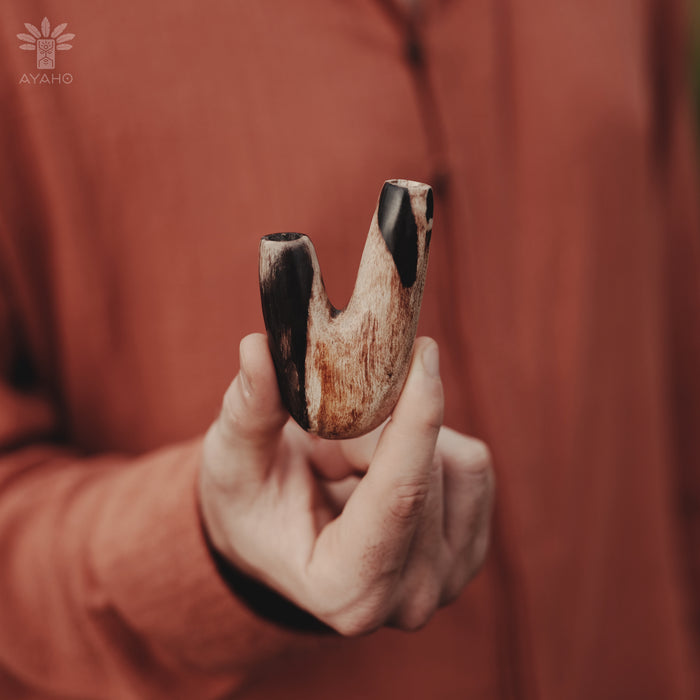 Earthy vibes of the Kuripe pipe made from petrified wood, perfect for a natural lifestyle.