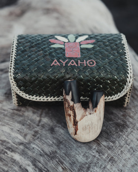 Handcrafted beauty of the Kuripe pipe made from petrified wood, a true artisan piece.