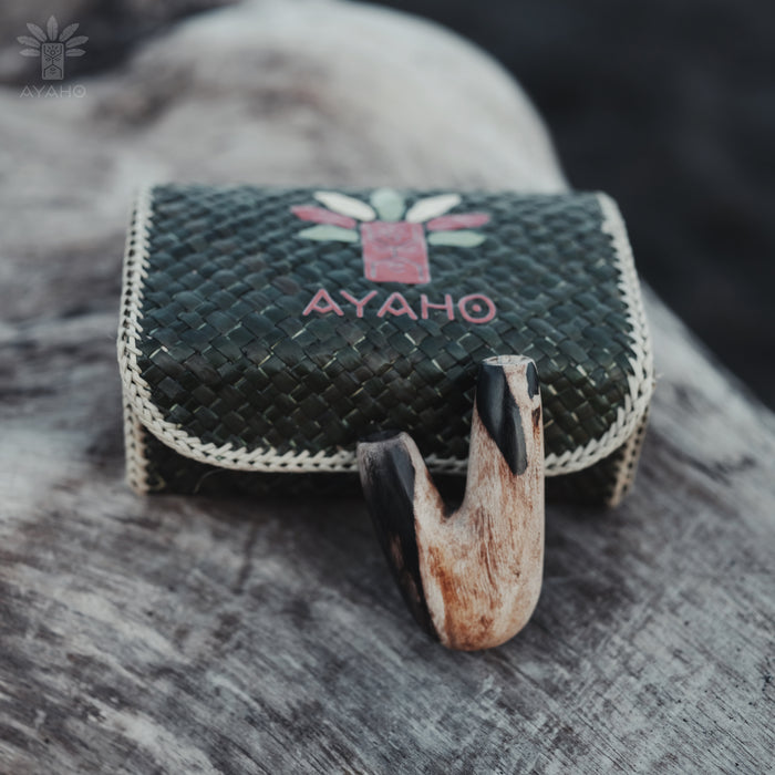 Natural wonders reflected in the Kuripe pipe crafted from petrified wood, a unique find.