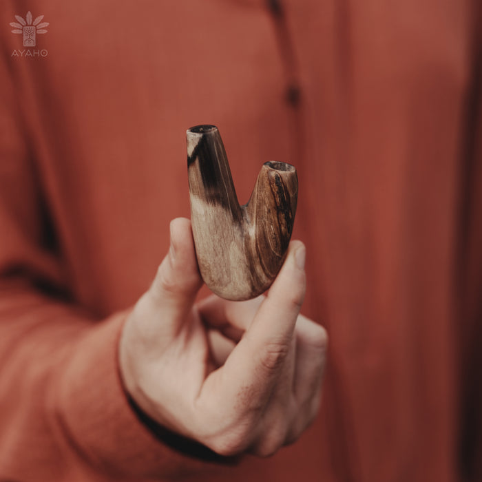 Nature's legacy in the Kuripe pipe crafted from petrified wood, a piece of history.