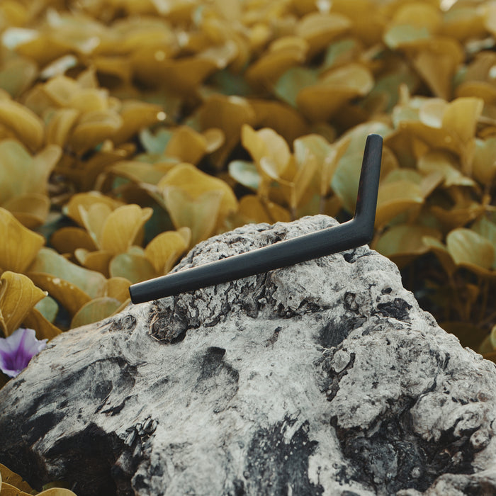 Close-up of rosewood tepi pipe highlighting flawless surface finish and warm tones of natural timber