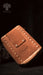 Minimalist leather pouch for storing sacred items and tools.
