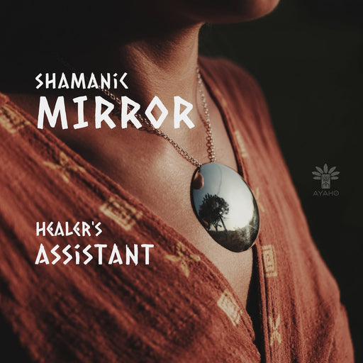 A woman presents a shamanic set featuring a copper mirror amulet necklace and minimalist silver earrings, embodying boho chic. These unique, handmade pieces serve as talismans for meditation, and protection, symbolizing spiritual gifts