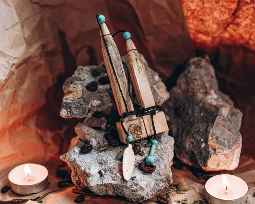 Dual-purpose hapé applicator made from warm-toned tamarind wood, featuring onyx and turquoise gemstone details