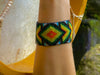 Handwoven bead loom bracelets with Ayahuasca-inspired tribal patterns, combining shamanic tools and talisman amulets for spiritual adornment