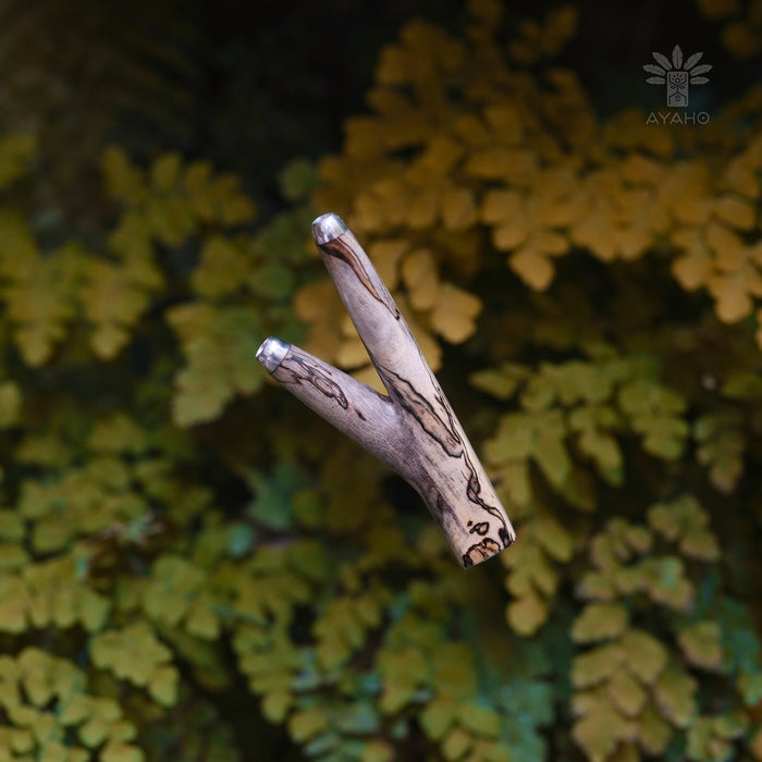 a tamarind wood kuripe pipe, intricately carved for hape snuff application, combining traditional shamanic utility with herbal medicinal practices