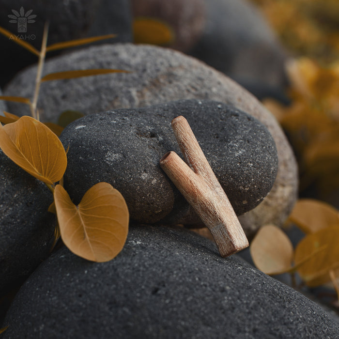 Artistic view of the teakwood kuripe, showcasing its unique design and natural beauty