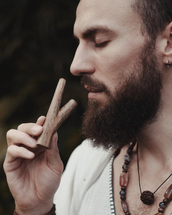 Handcrafted teakwood kuripe, emphasizing the quality and craftsmanship involved in its creation.