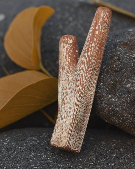 Teakwood kuripe symbolizing spiritual essence and personal growth in shamanic rituals