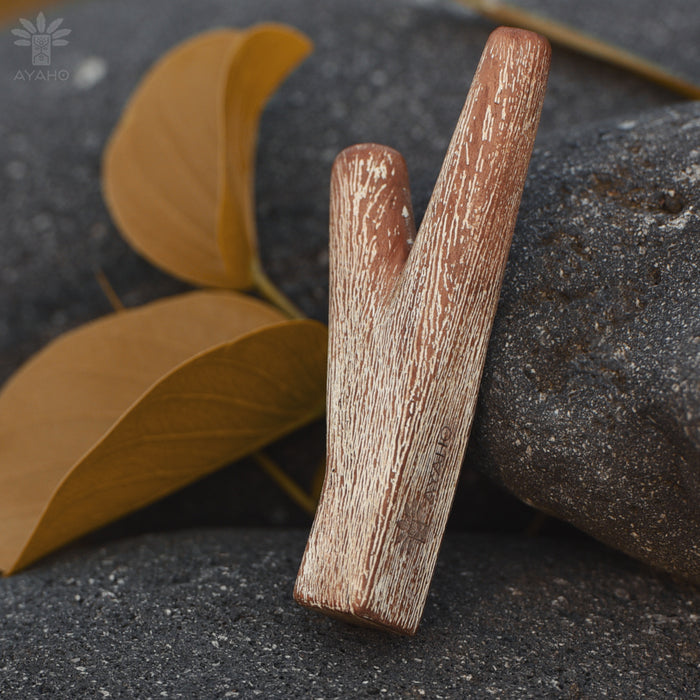 Teakwood kuripe symbolizing spiritual essence and personal growth in shamanic rituals