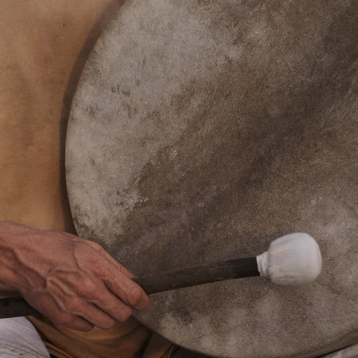 Engage your senses with the vibrant sounds of this tunable handmade shaman drum, perfect for ceremonies.