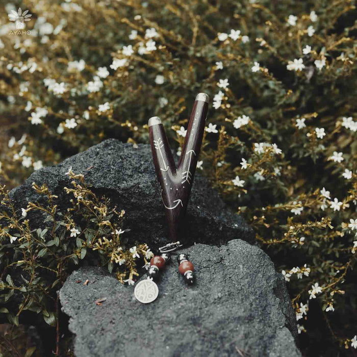 Wooden Intention kuripe pipe necklace with silver accents for hape snuff, a unique, handcrafted shamanic tool for herbal medicine rituals.