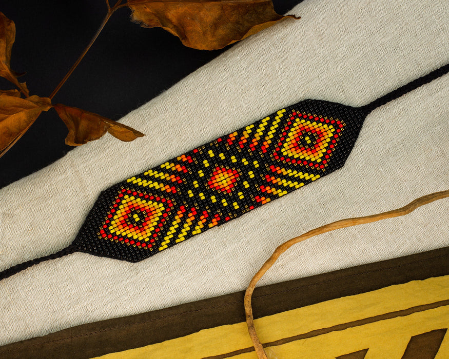 Handwoven bead loom bracelets with Ayahuasca-inspired tribal patterns, combining shamanic tools and talisman amulets for spiritual adornment
