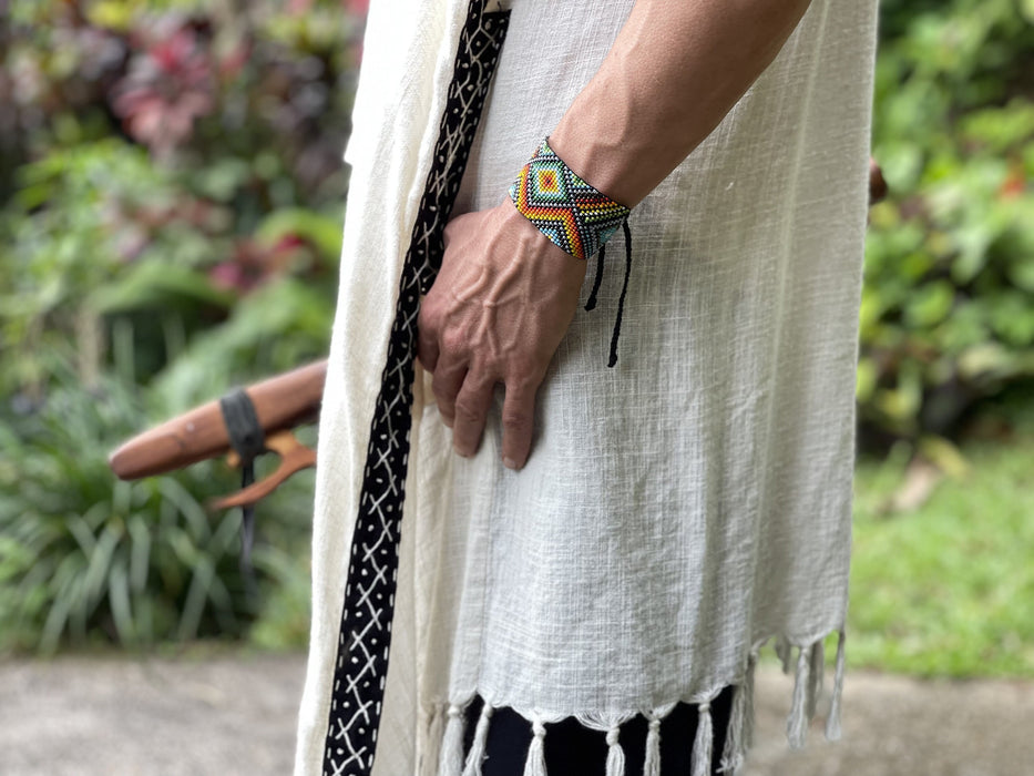 Handwoven bead loom bracelets with Ayahuasca-inspired tribal patterns, combining shamanic tools and talisman amulets for spiritual adornment