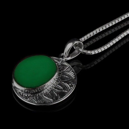 Striking ye ming zhu pendant encapsulated in intricate silver, a magic item believed to grant protection and fortune, perfect for anniversaries or spiritual milestones