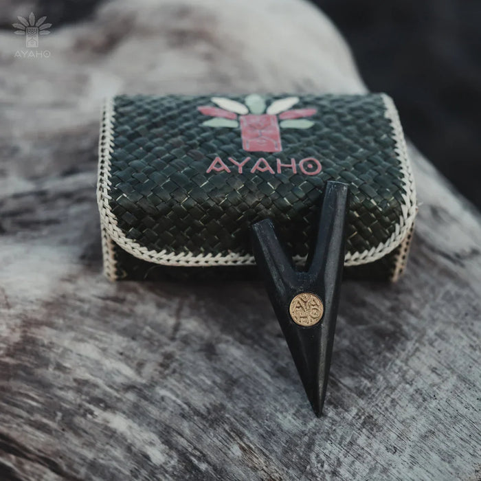 Black bow and arrow set with Ayaho branding on a textured surface