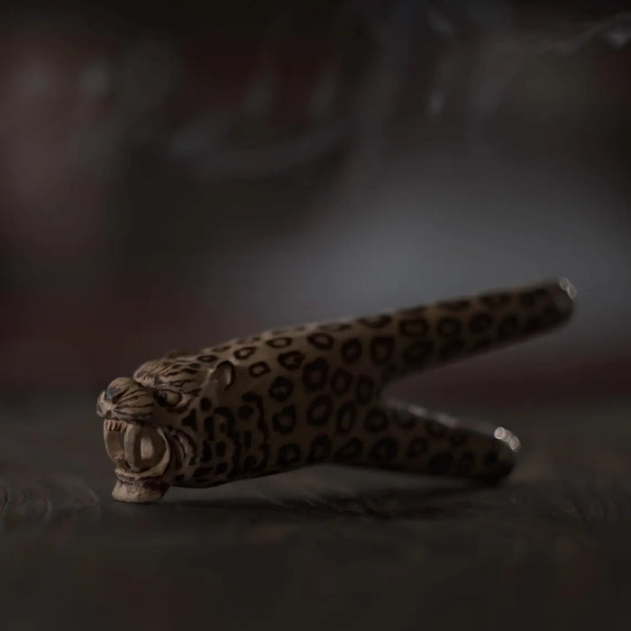 Decorative item with leopard print design on a dark background
