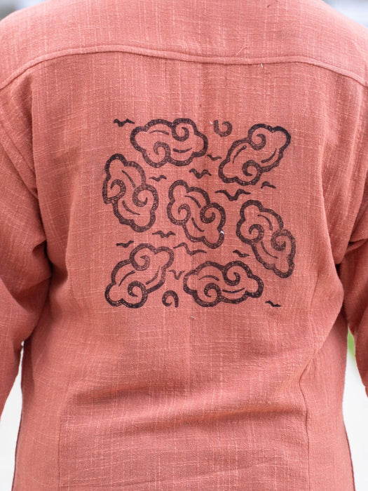 Pink shirt with cloud pattern on the back
