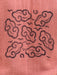 Decorative cloud pattern on a textured pink fabric background