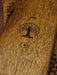 Wooden surface with a tree engraving