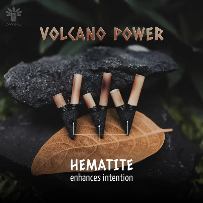 Set of black and wooden tools on a leaf with 'Volcano Power' and 'Hematite' text.