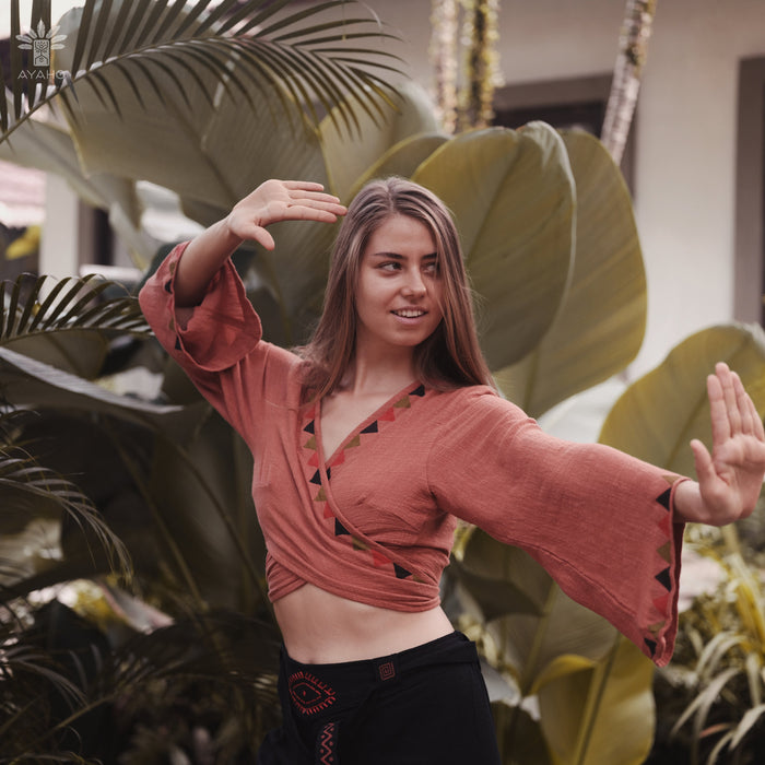 Discover the epitome of freedom and individuality with our exquisite Cotton Boho Crop Top, a garment that speaks to the soul of the free-spirited.