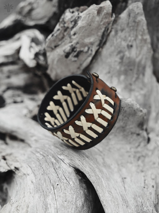 Bold, thick buffalo hide bracelet, handcrafted for a masculine, spiritual statement with raw, rugged beauty.