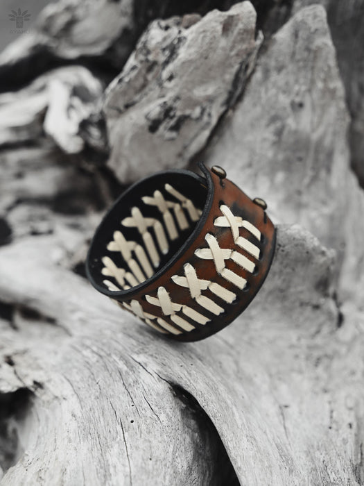 Bold, thick buffalo hide bracelet, handcrafted for a masculine, spiritual statement with raw, rugged beauty.
