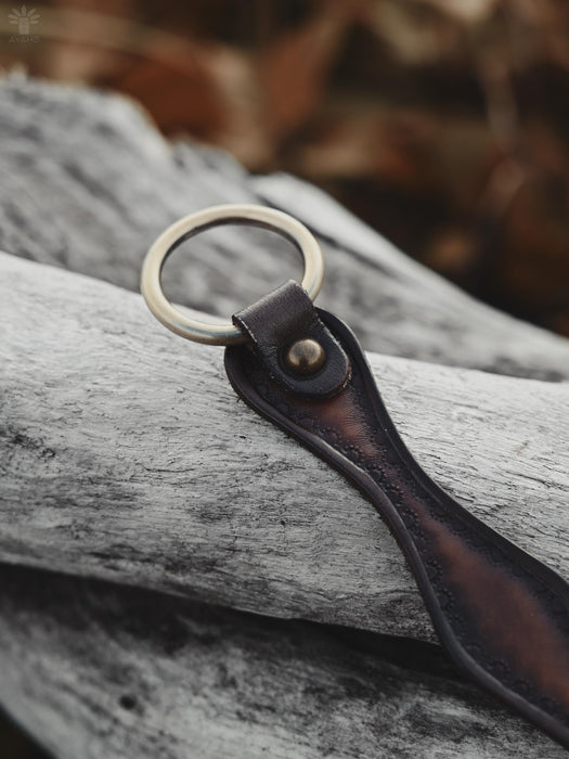 Buffalo leather bracelet featuring a triple-infinity motif — representing cycles of life, inner balance, and sacred energy.