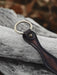 Buffalo leather bracelet featuring a triple-infinity motif — representing cycles of life, inner balance, and sacred energy.