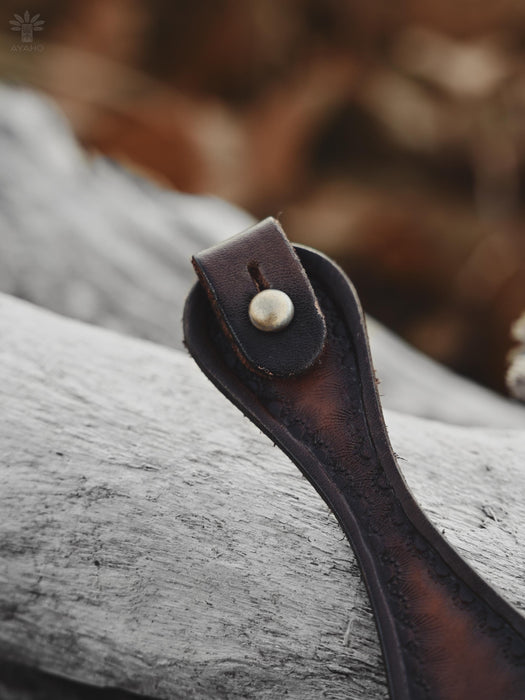 Unique, handcrafted buffalo leather bracelet with a sculptural triple-infinity design, made for those who walk between worlds.
