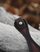 Unique, handcrafted buffalo leather bracelet with a sculptural triple-infinity design, made for those who walk between worlds.