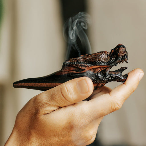 Hand carved wooden tobacco pipe, a shamanic tool for mapacho, displayed on driftwood—ideal for ceremonial use and a unique gift for smoking herbs